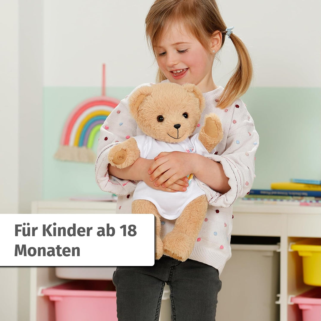 BABY born Singender Teddy, Plüschbär mit Soundfunktion, weissem Strampler und beweglichen Armen und